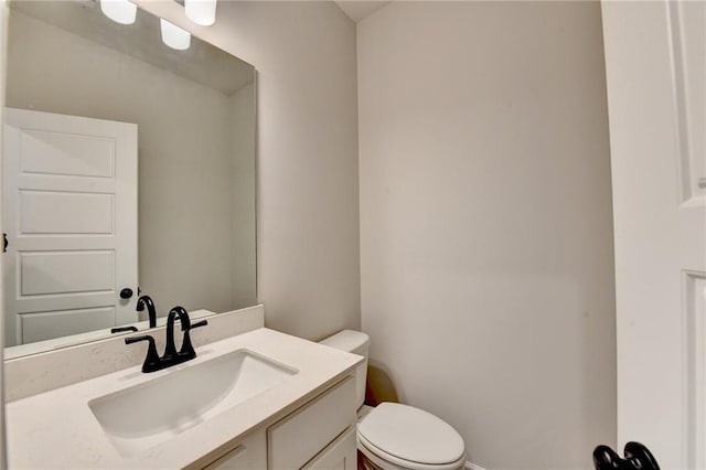 1620 Branthaven Ln, Auburn, GA 30011 - half bathroom featuring vanity and toilet