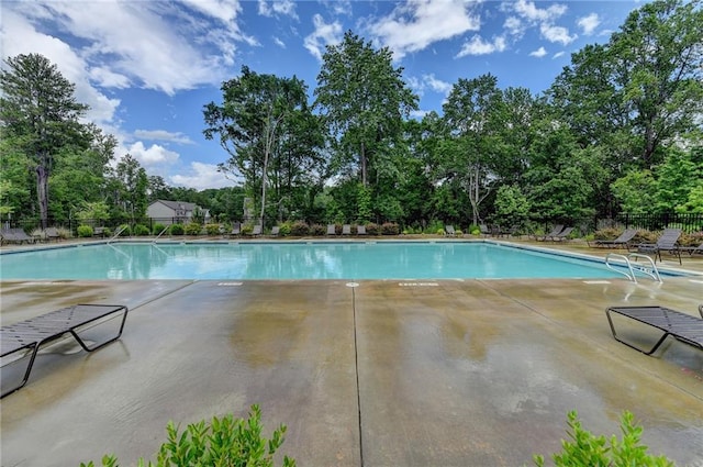 1620 Branthaven Ln, Auburn, GA 30011 - community pool with a patio area and view of wooded area