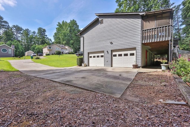 3491 Birchwood Trl, Snellville, GA 30078 - view of property exterior featuring an attached garage, driveway, a lawn, and a sunroom