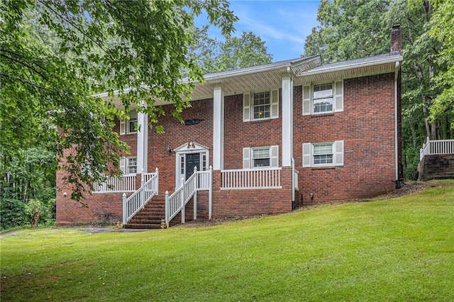 5247 Yeager Rd, Douglasville, GA 30135 - neoclassical / greek revival house with a front yard, a chimney, and brick siding