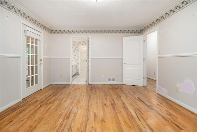 5247 Yeager Rd, Douglasville, GA 30135 - unfurnished bedroom with ornamental molding, wood finished floors, baseboards, and ensuite bathroom