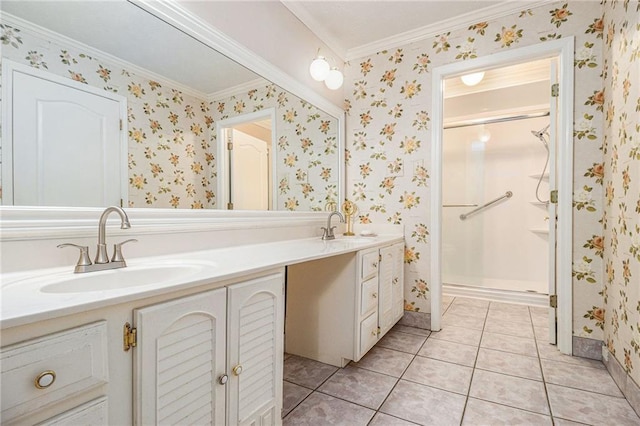 5247 Yeager Rd, Douglasville, GA 30135 - bathroom featuring ornamental molding, double vanity, a shower stall, tile patterned floors, and wallpapered walls
