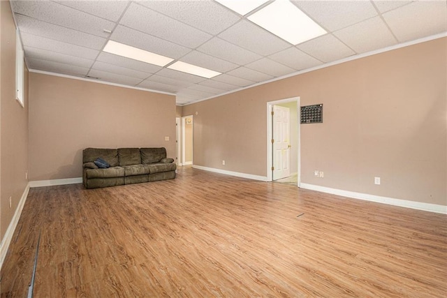 5247 Yeager Rd, Douglasville, GA 30135 - unfurnished room with wood finished floors, crown molding, baseboards, and a drop ceiling