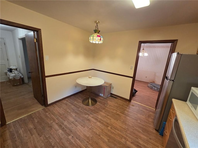 3400 Elm Creek Dr NW, Marietta, GA 30064 - dining room with wood finished floors and a chandelier