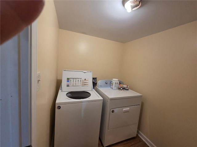 3400 Elm Creek Dr NW, Marietta, GA 30064 - laundry room with washing machine and dryer and dark wood-type flooring