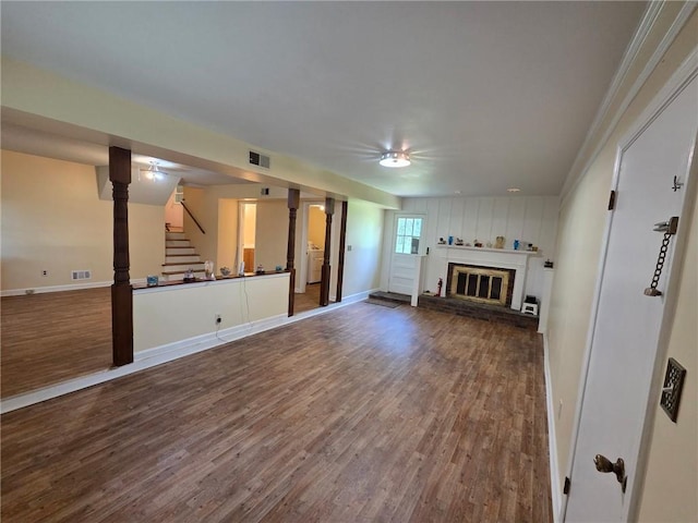 3400 Elm Creek Dr NW, Marietta, GA 30064 - unfurnished living room featuring wood finished floors, stairway, ceiling fan, and a fireplace