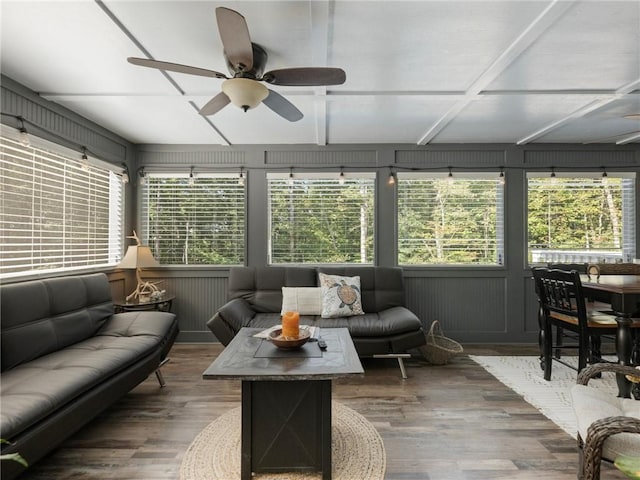 sunroom / solarium with ceiling fan and plenty of natural light