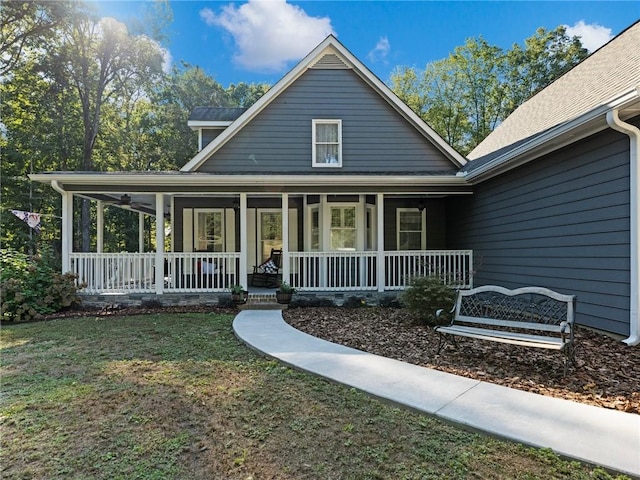 farmhouse inspired home featuring covered porch