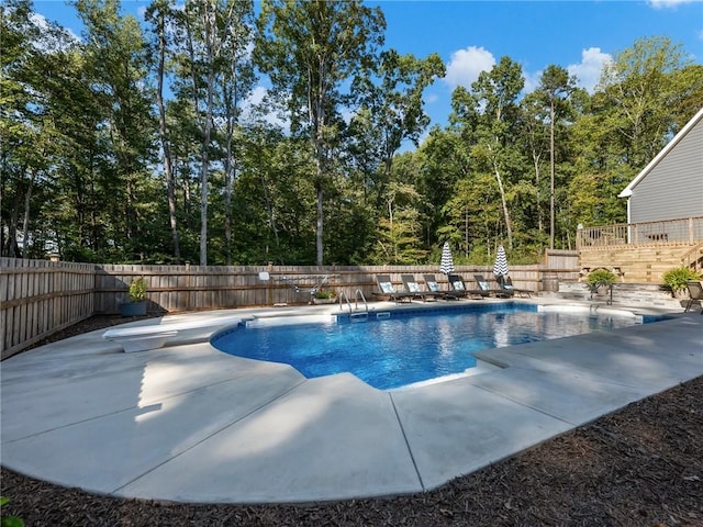 view of pool featuring a patio