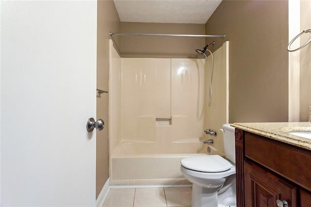 full bath featuring bathtub / shower combination, toilet, vanity, baseboards, and tile patterned floors