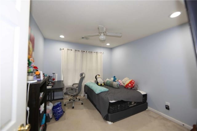 carpeted bedroom with ceiling fan