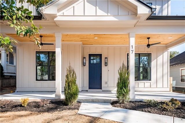 entrance to property with covered porch and ceiling fan