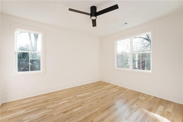 unfurnished room featuring ceiling fan and light wood-type flooring