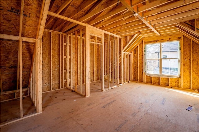 misc room with lofted ceiling