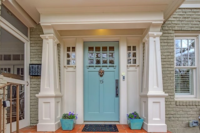 view of exterior entry with stone siding