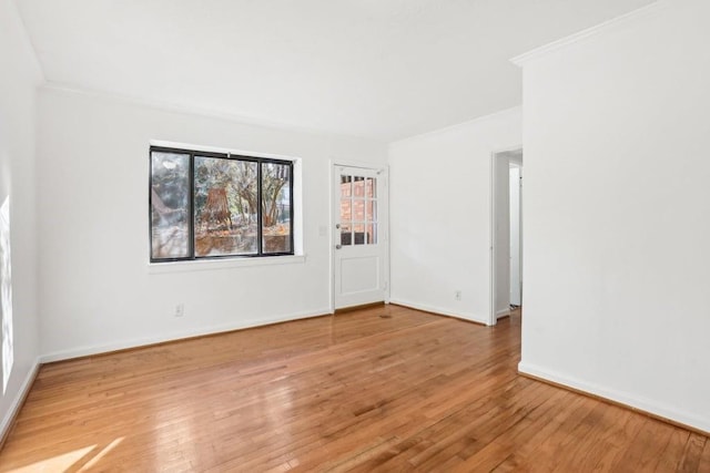 spare room featuring wood-type flooring