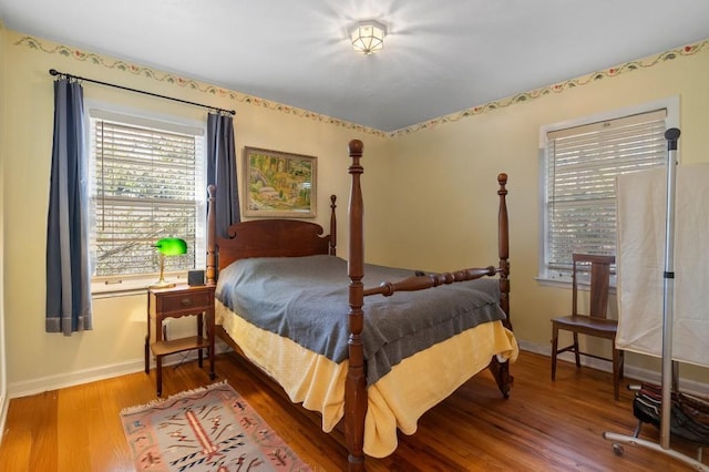 bedroom with hardwood / wood-style floors