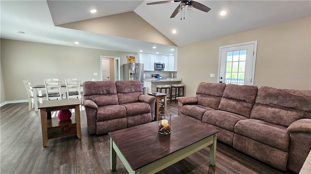 living area with baseboards, a ceiling fan, dark wood finished floors, recessed lighting, and high vaulted ceiling