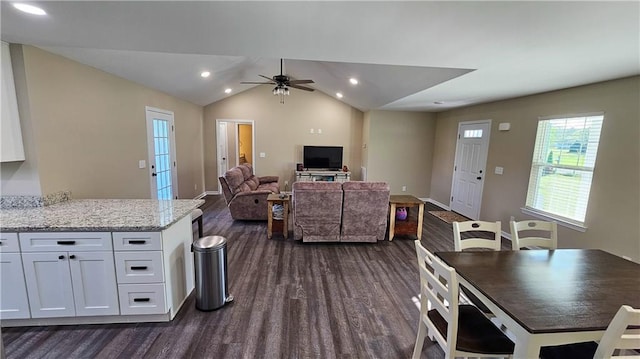 living room with dark wood-type flooring, a ceiling fan, vaulted ceiling, recessed lighting, and baseboards