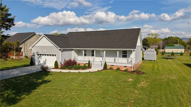 view of front facade featuring a shingled roof, driveway, a front lawn, and covered porch