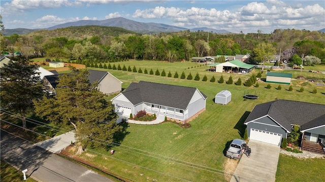 bird's eye view with a rural view and a mountain view