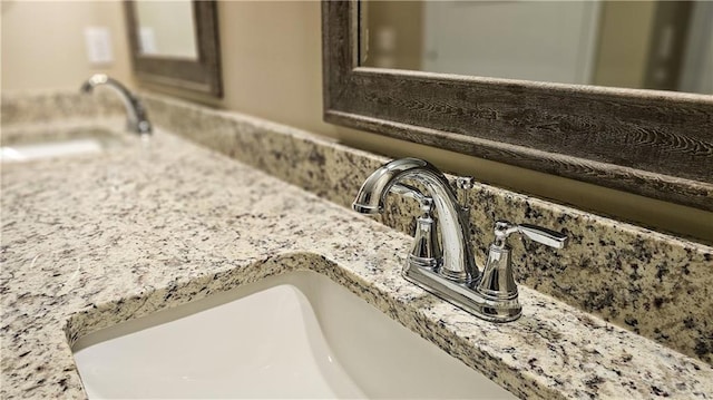 interior details featuring a sink