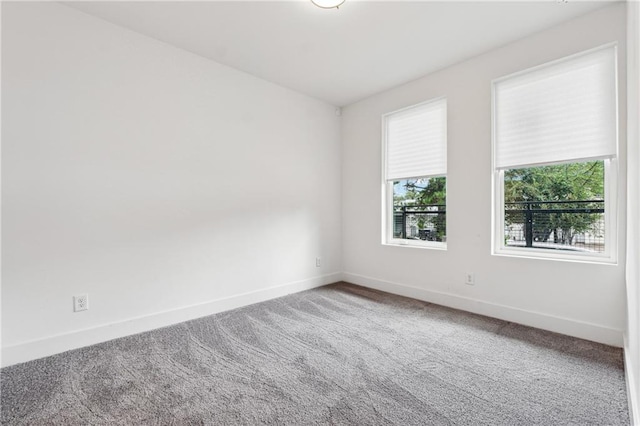 spare room featuring carpet flooring