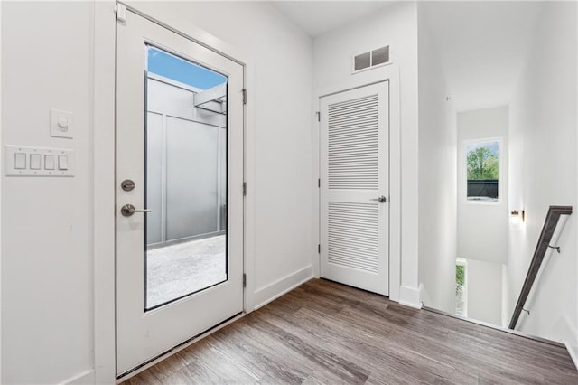 entryway with light hardwood / wood-style flooring