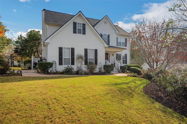 view of property featuring a front yard