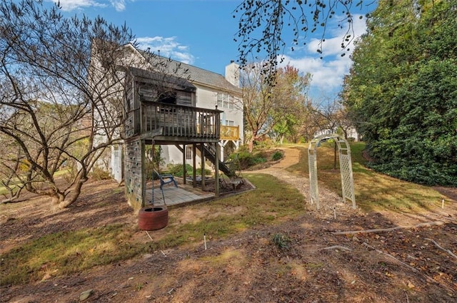 view of yard featuring a deck