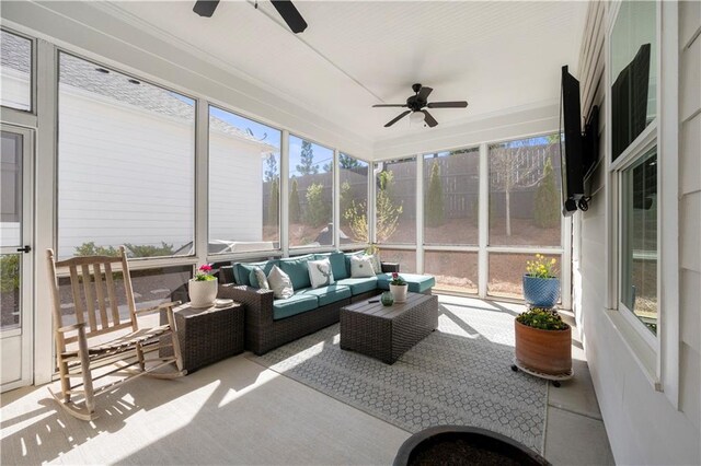 sunroom with an outdoor hangout area and ceiling fan