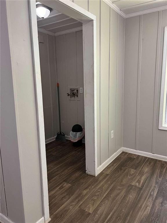 hallway with dark hardwood / wood-style floors