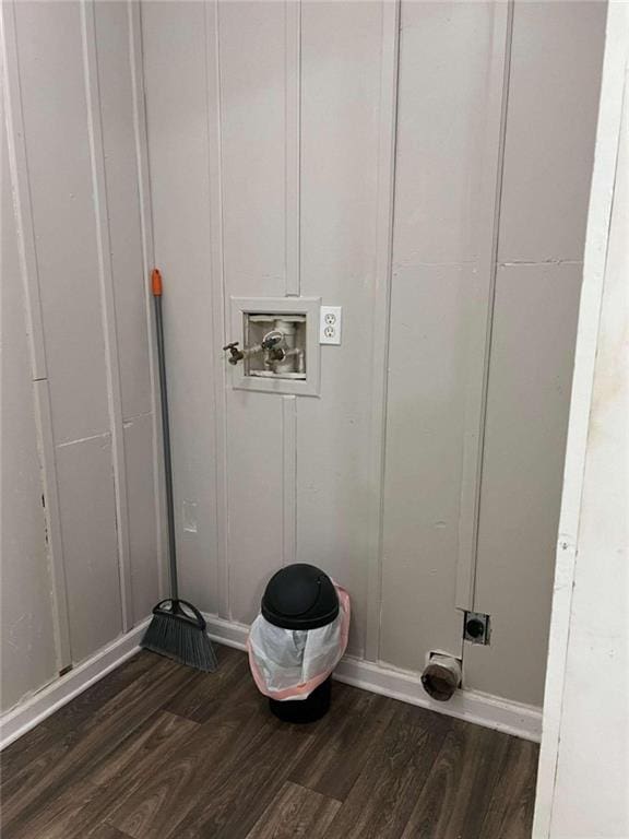 clothes washing area with electric dryer hookup, hookup for a washing machine, and dark hardwood / wood-style floors