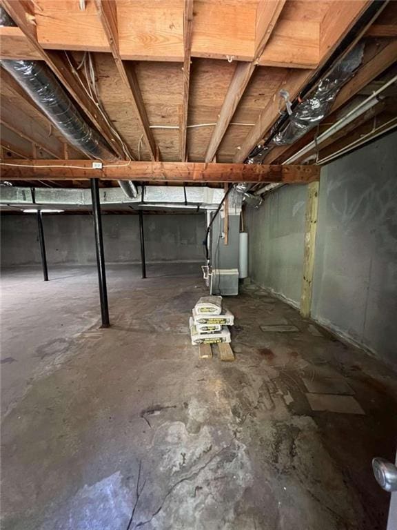 basement with heating unit and water heater