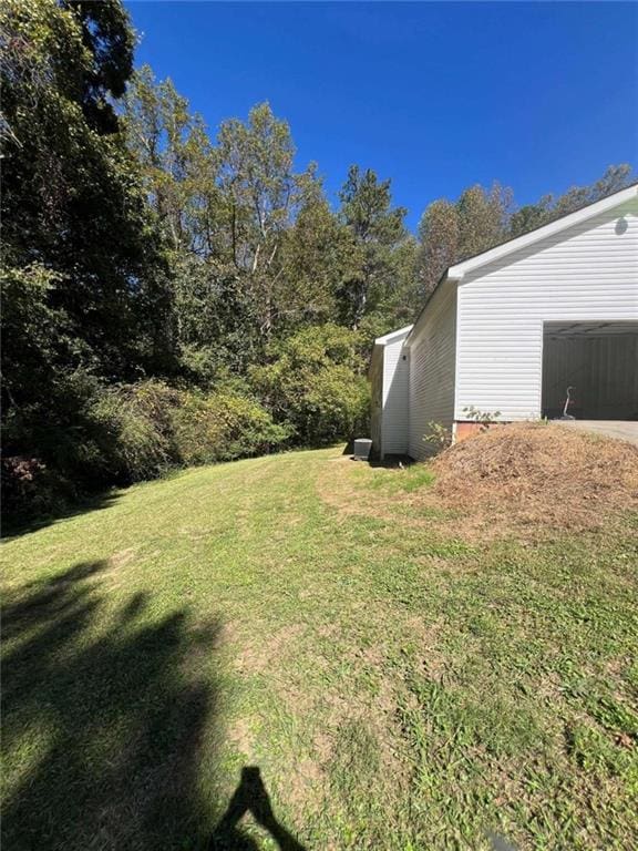 view of yard featuring a garage