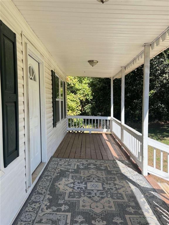 wooden terrace with covered porch