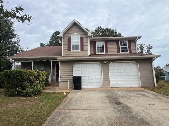 view of front of home with a garage