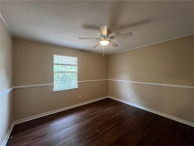 unfurnished room with dark wood-type flooring, ceiling fan, a textured ceiling, and ornamental molding