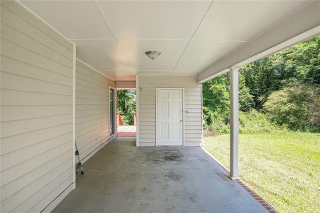 view of patio / terrace featuring an attached carport