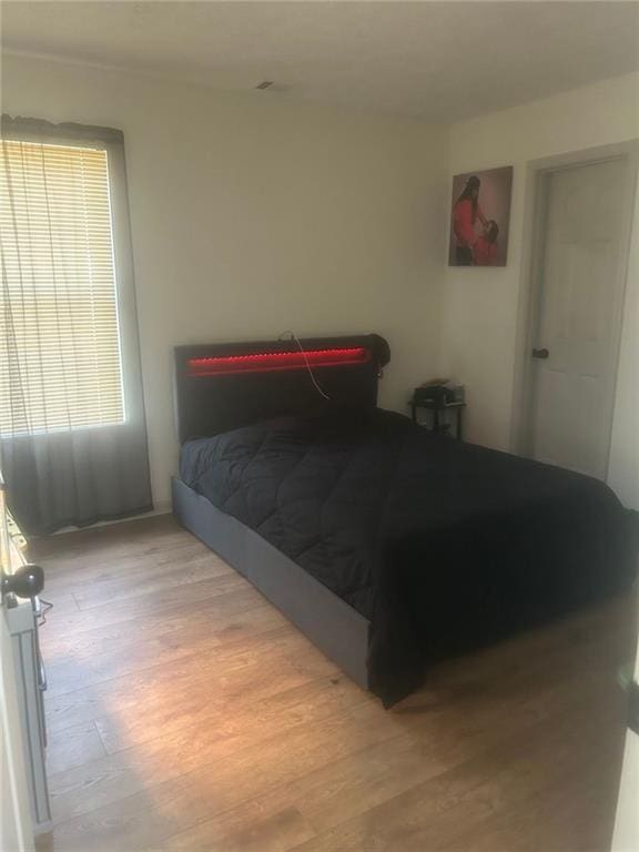 bedroom featuring light hardwood / wood-style flooring