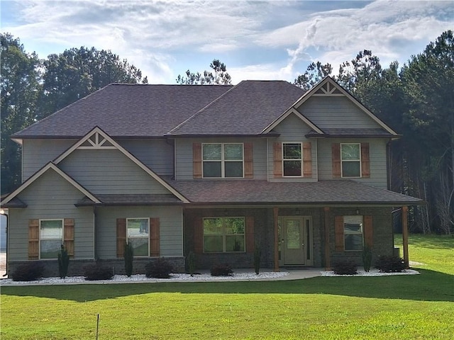 2647 Old Snapping Shoals Rd, Mcdonough, GA 30252 - craftsman-style house with a front lawn and a shingled roof