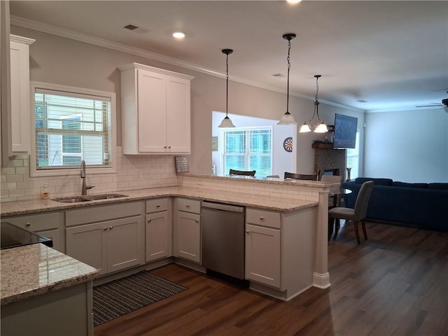 2647 Old Snapping Shoals Rd, Mcdonough, GA 30252 - kitchen with stainless steel dishwasher, a sink, a peninsula, dark wood finished floors, and white cabinets