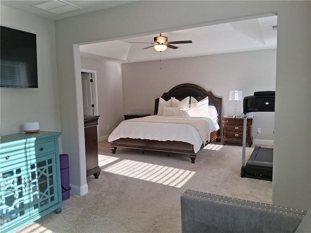 2647 Old Snapping Shoals Rd, Mcdonough, GA 30252 - bedroom with carpet flooring, baseboards, a raised ceiling, and a ceiling fan