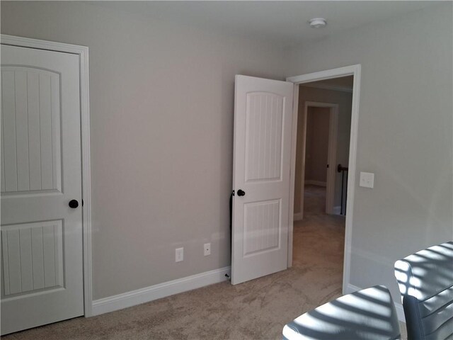 2647 Old Snapping Shoals Rd, Mcdonough, GA 30252 - unfurnished bedroom featuring carpet and baseboards