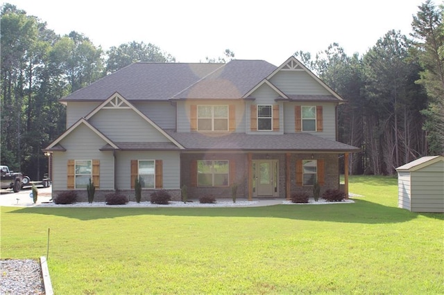 2647 Old Snapping Shoals Rd, Mcdonough, GA 30252 - view of front of house with a front yard and roof with shingles