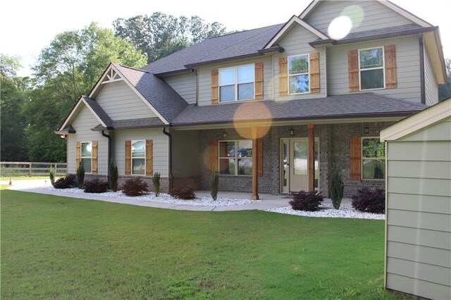 2647 Old Snapping Shoals Rd, Mcdonough, GA 30252 - craftsman inspired home with roof with shingles and covered porch
