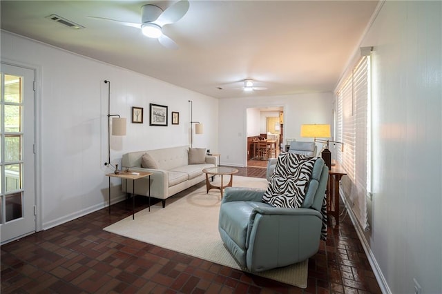 67 Dixie Park Rd, Rome, GA 30165 - living room featuring a ceiling fan and brick flooring