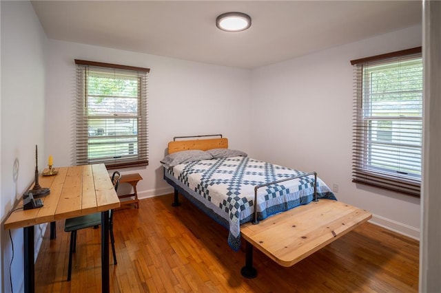 67 Dixie Park Rd, Rome, GA 30165 - bedroom featuring wood finished floors and baseboards