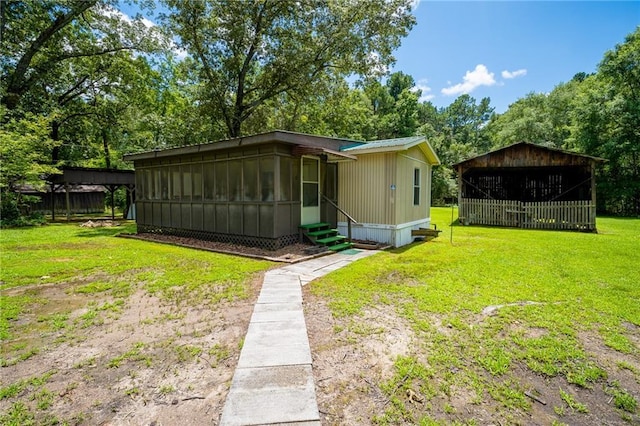 67 Dixie Park Rd, Rome, GA 30165 - back of property featuring entry steps, a yard, and view of scattered trees