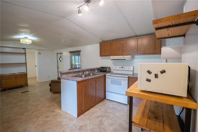 67 Dixie Park Rd, Rome, GA 30165 - kitchen featuring white range with electric stovetop, under cabinet range hood, a peninsula, brown cabinets, and vaulted ceiling
